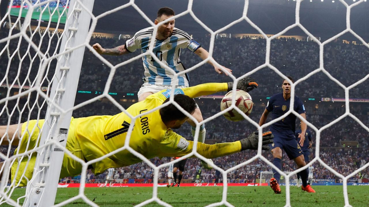 Lionel Messi scores Argentina's third goal.