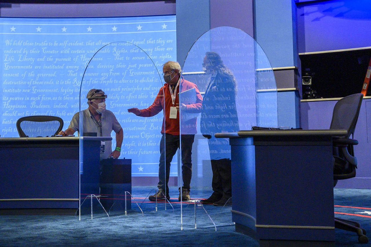 Plexiglass protections between the debaters are seen on the stage of the debate hall ahead of the vice presidential debate in Kingsbury Hall of the University of Utah October 6, in Salt Lake City.