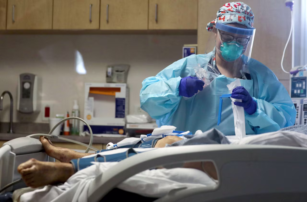 A nurse cares for a coronavirus patient in the Intensive Care Unit at El Centro Regional Medical Center on July 28 in El Centro, California. 
