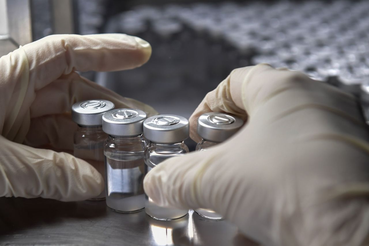 An employee works on the production line of CoronaVac, Sinovac Biotech's vaccine against Covid-19, at the Butantan biomedical production center in Sao Paulo, Brazil, on January 14.