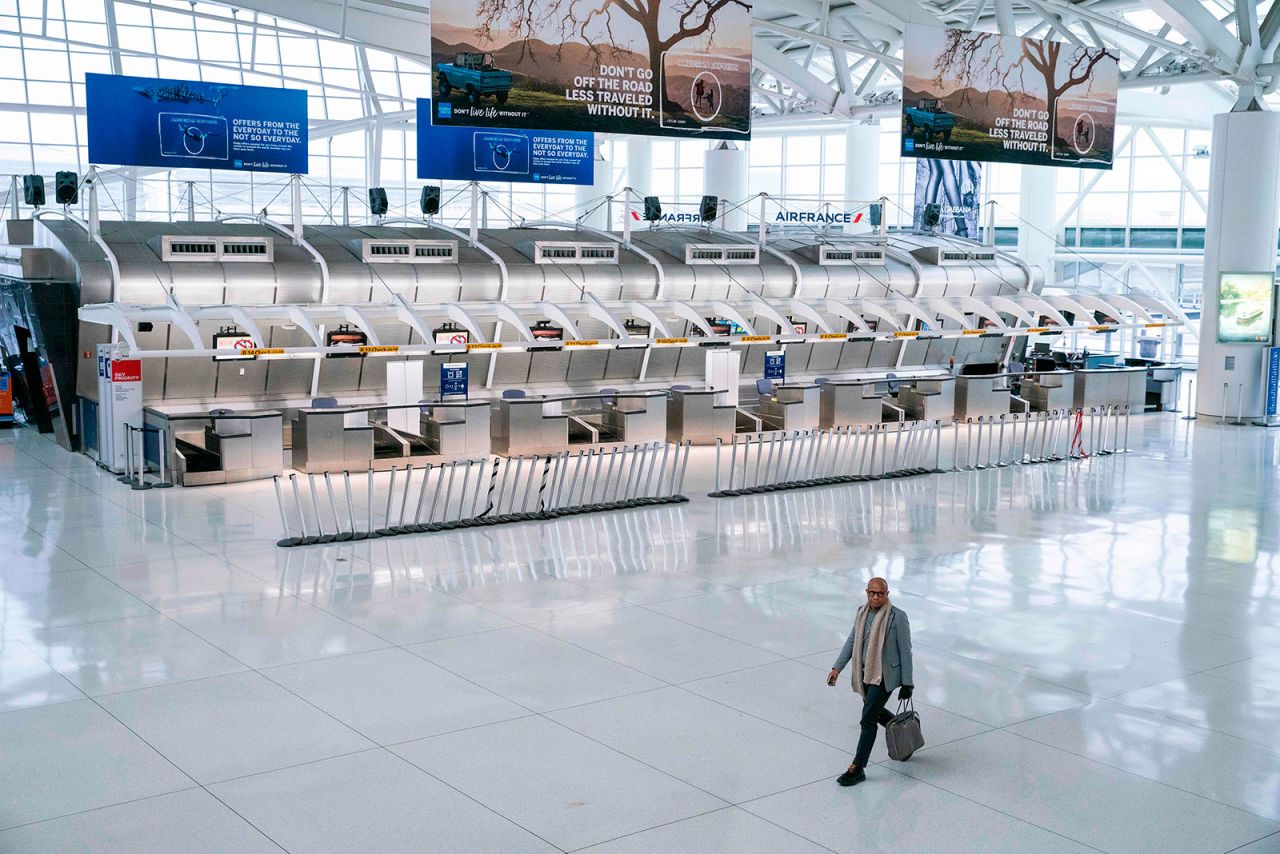 A man walks through Terminal 1 at John F. Kennedy International Airport on March 12.