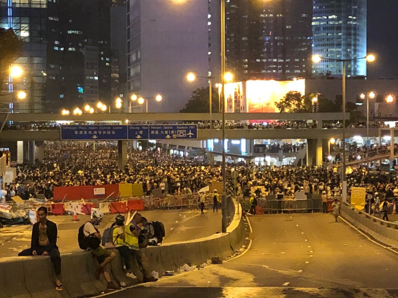 Protesters gather on Harcourt Road in front of City Hall.