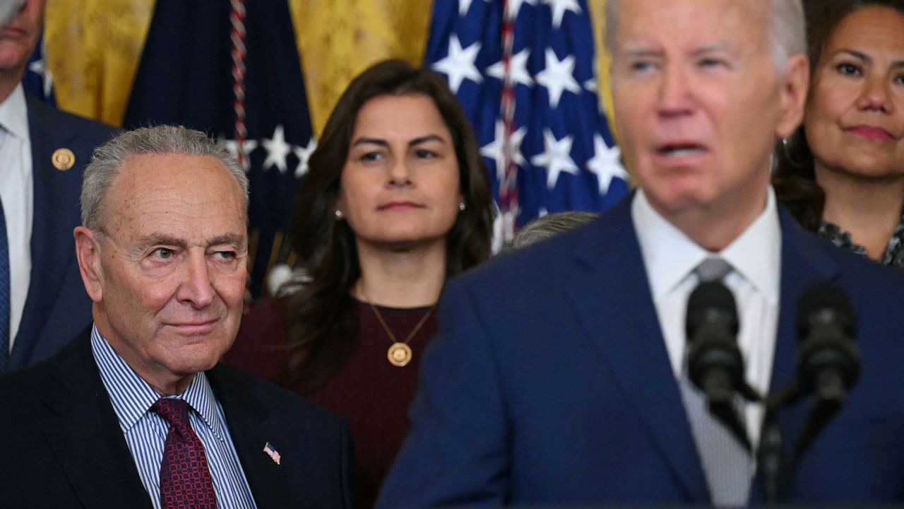 Senate Majority Leader Chuck Schumer looks on as President Joe Biden speaks at an event marking the 12th anniversary of Deferred Action for Childhood Arrivals (DACA) at the White House in Washington, DC, on June 18. 