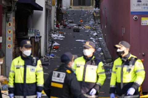 South Korean police officers stand guard at the scene in Seoul on Sunday.