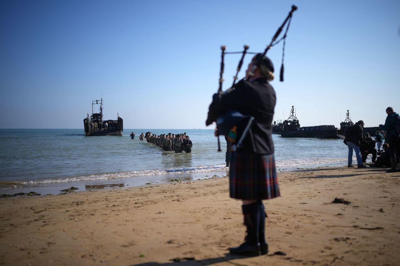 Royal Marines of 47 Commando land at Gold Beach to mark the 80th anniversary of the D-Day landing on June 6, in Asnelles, France.