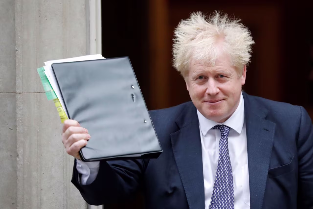 Boris Johnson leaves Downing Street for PMQs.