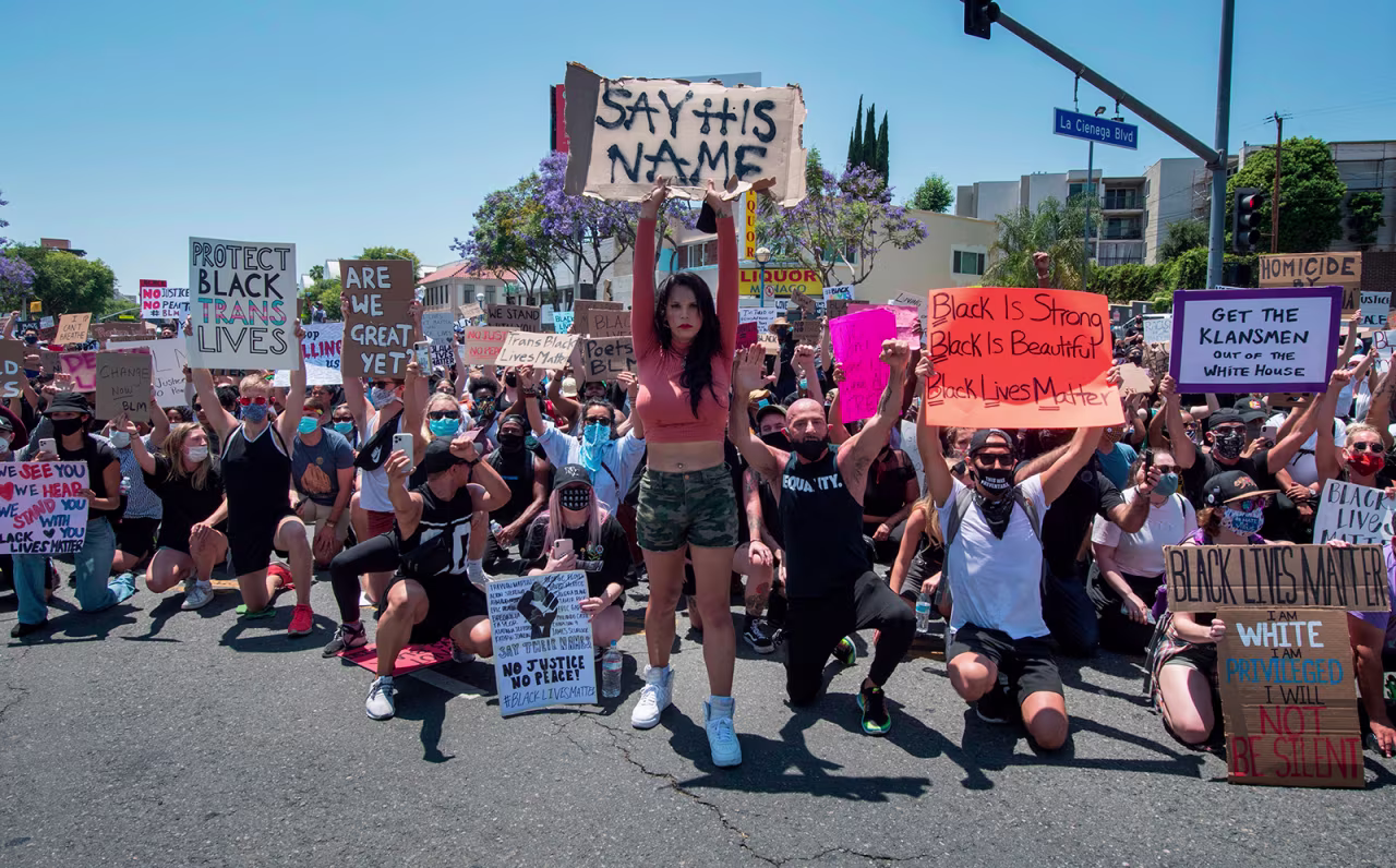 Demonstrators march as they protest the death of George Floyd, in West Hollywood, California on June 3.