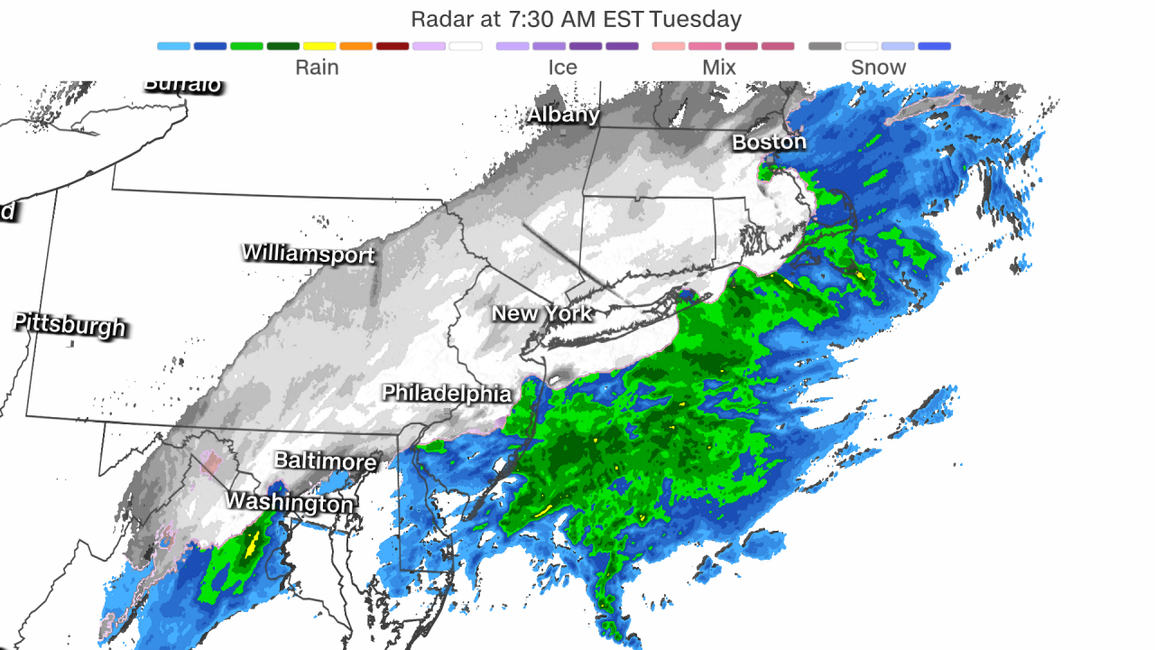 This radar snapshot shows snow falling across a large portion of the Northeast, while mainly rain falls just off the coast.