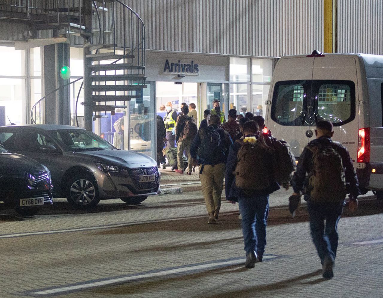 In this photo from the UK Ministry of Defence, British Nationals and Embassy Staff from Afghanistan arrive at RAF Brize Norton.