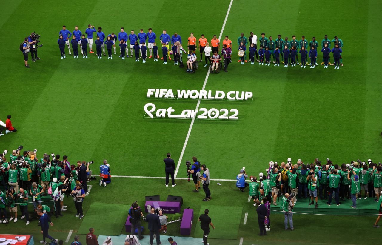 Players from both England and?Senegal line up before the match?at Al Bayt Stadium in Al Khor, Qatar on Sunday.