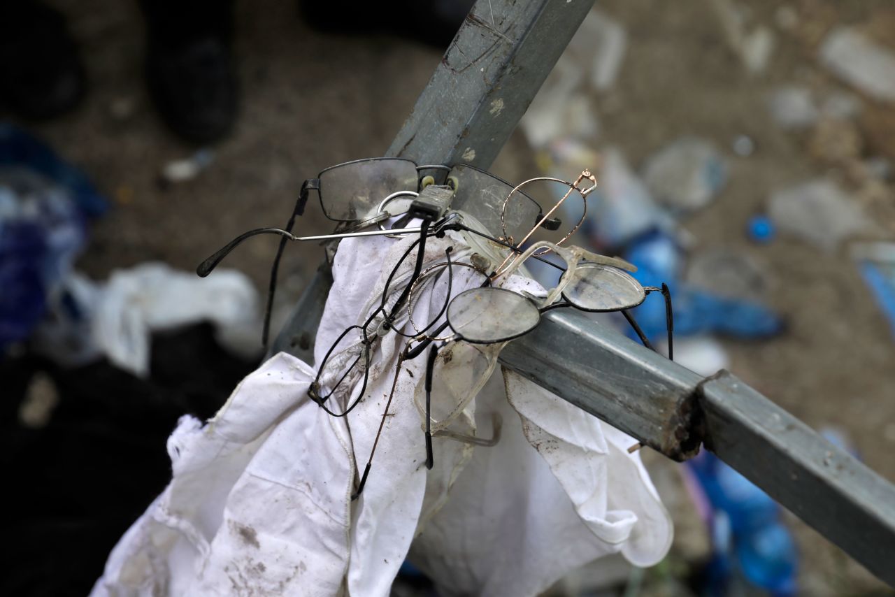 Broken glasses are seen at the site of the tragedy on Friday.  