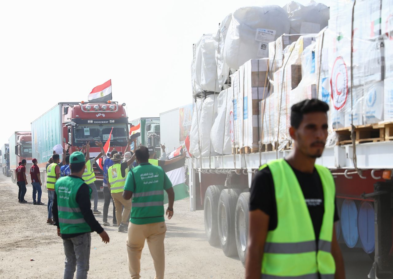 Trucks carrying humanitarian aid for Palestinians enter Gaza through the Rafah border crossing on the Egyptian border in Rafah, Gaza on October 22.