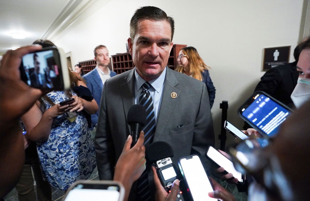 Rep. Austin Scott talks with reporters in the Capitol on October 13.