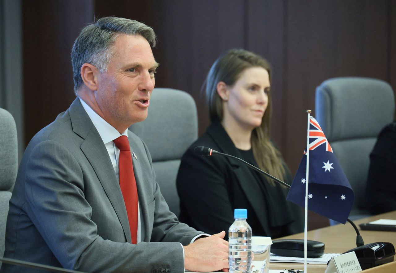 Richard Marles (L) attends a meeting at the Defense Ministry in Shinjuku Ward in Tokyo on October 19.