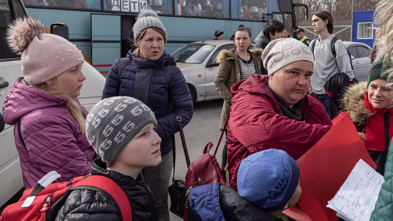 Evacuees from the Mariupol region arrive at reception center in Zaporizhzhia, Ukraine on March 31.