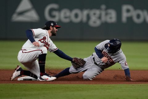 Jose Altuve of the Astros steals second past Braves shortstop Dansby Swanson during the eighth inning of Game 5.