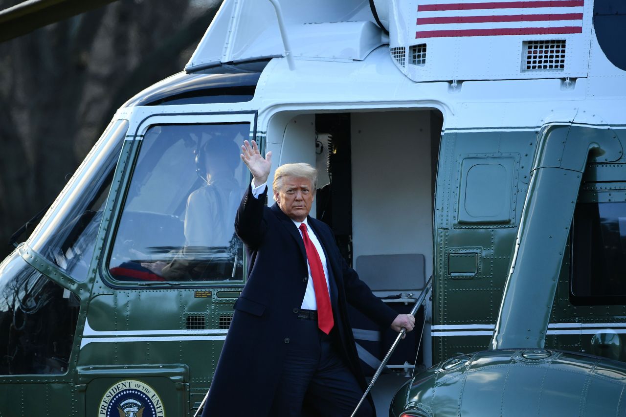 President Donald Trump waves as he boards Marine One at the White House on January 20.