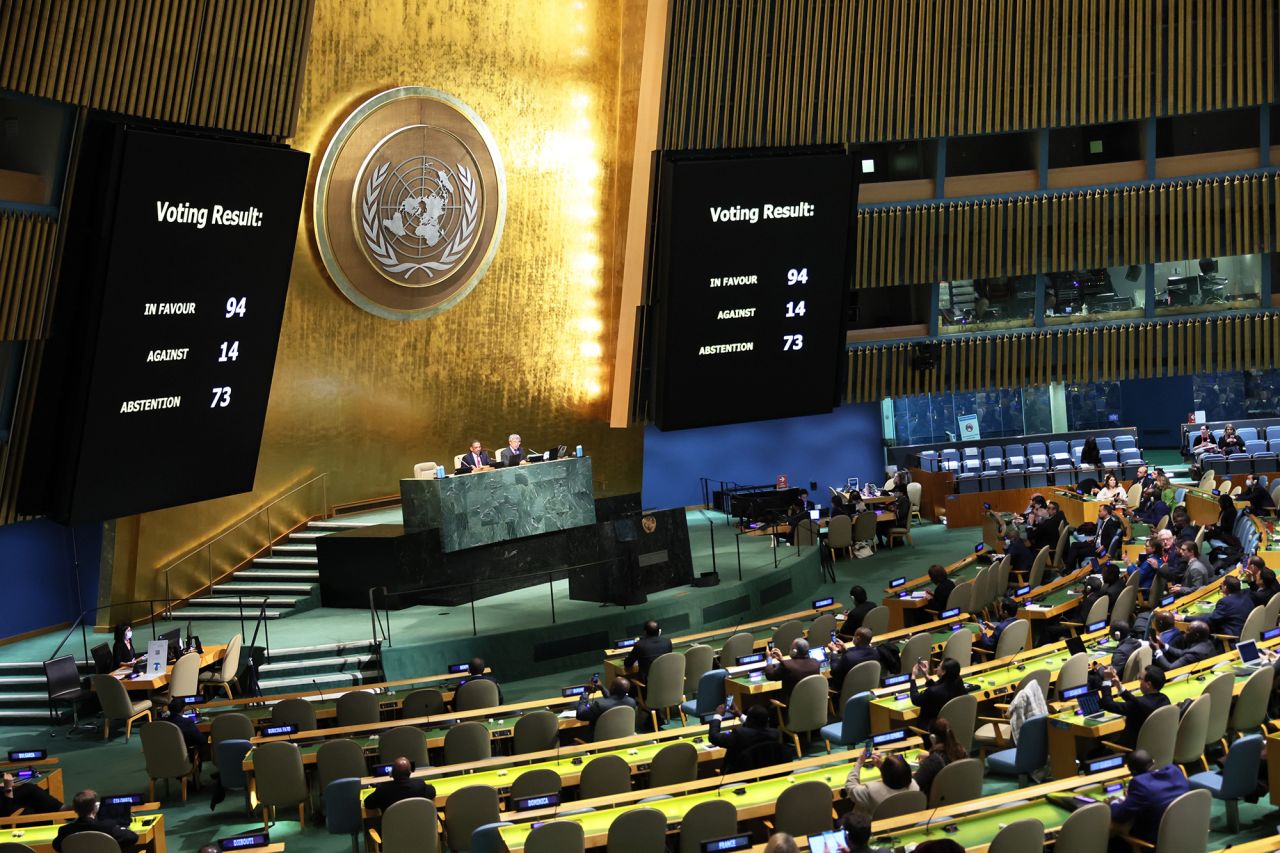 Members of the General Assembly vote on a draft resolution during a special session in the General Assembly Hall at United Nations Headquarters on November 14, in New York City. 