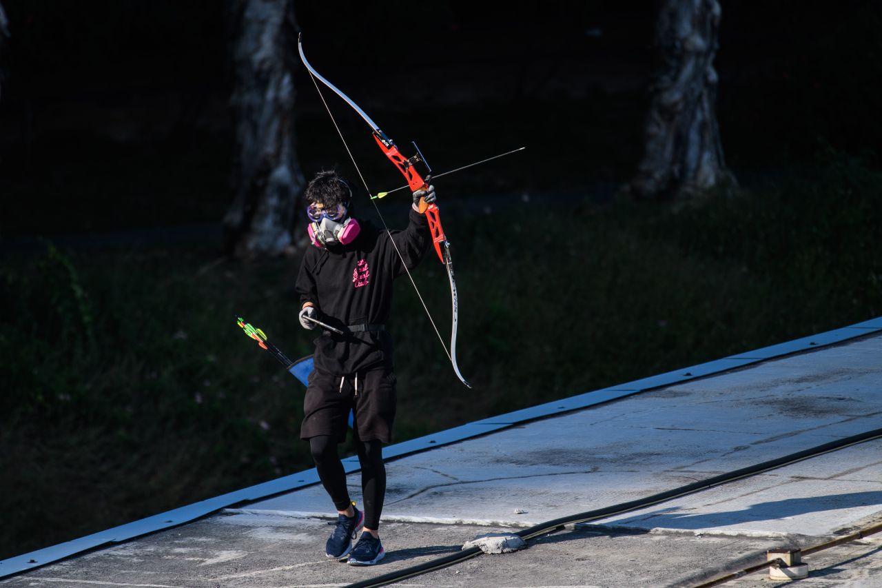 A protester with a bow and arrows near the Hong Kong Polytechnic University on November 16, 2019.