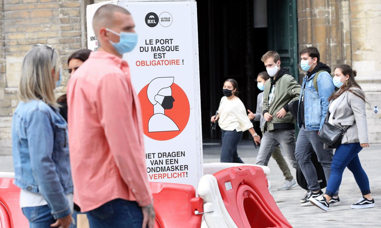 People in Brussels, Belgium, on September 9. The country's death toll surged past 10,000 on Tuesday.