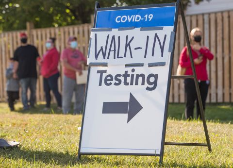 People wait in line for a Covid-19 test center in Brampton, Ontario, Canada, on September 21.