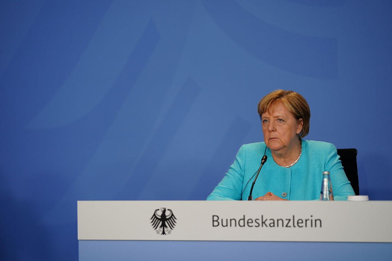 German Chancellor Angela Merkel speaks during a press conference as she meets with economic and financial organizations in Berlin at the German chancellery on August 26.