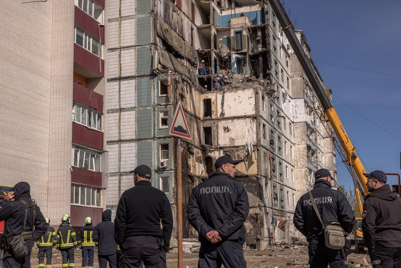 Emergency personnel work at the site of a destroyed residential building in Uman, Ukraine, on April 29. 
