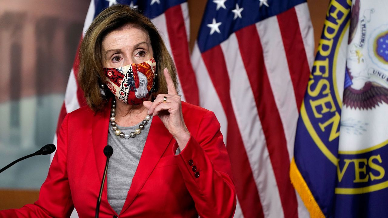 House Speaker Nancy Pelosi speaks to reporters during her weekly press conference on December 30 in Washington, DC.