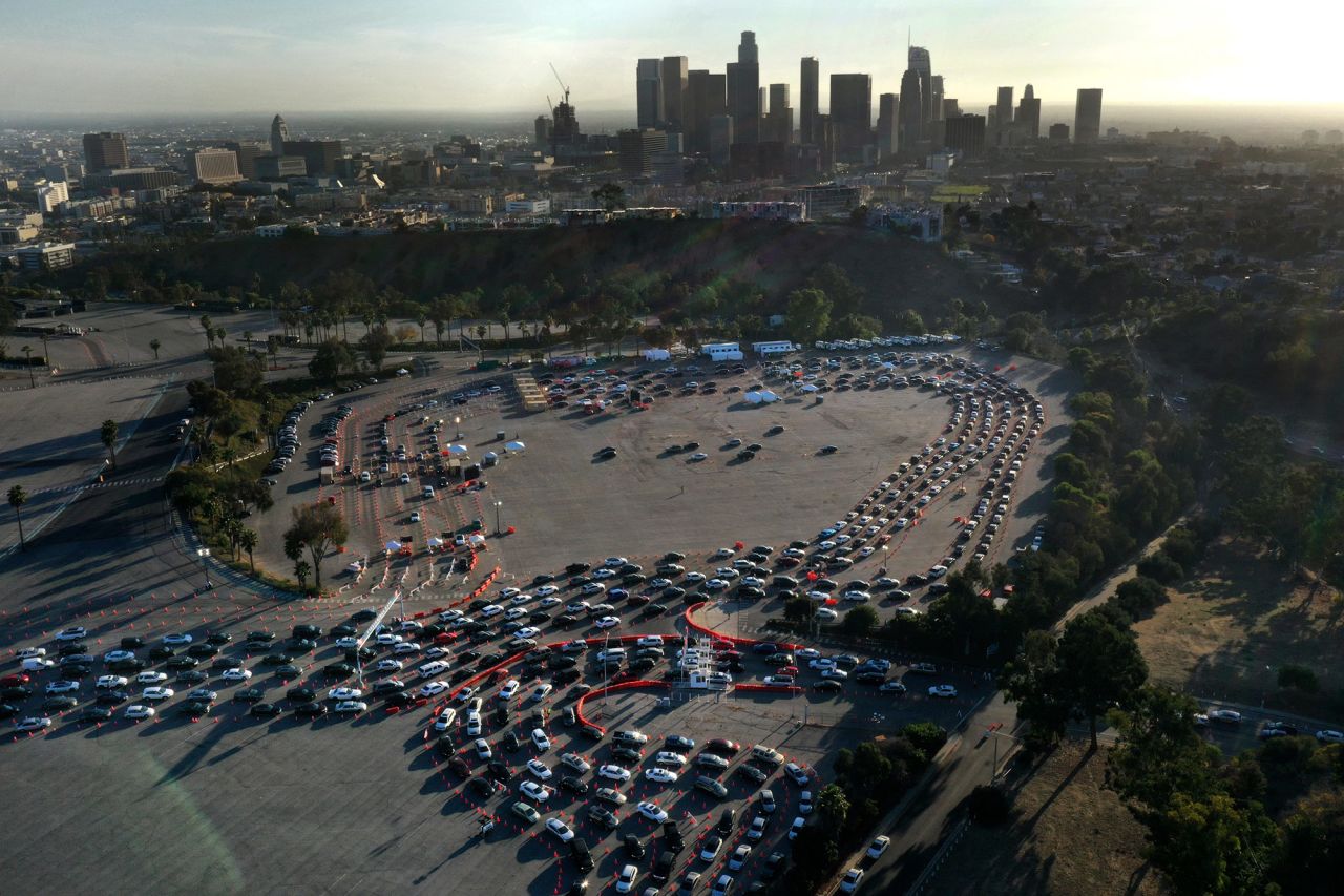 Cars line up at a coronavirus testing site at Dodger Stadium in Los Angeles on Monday.