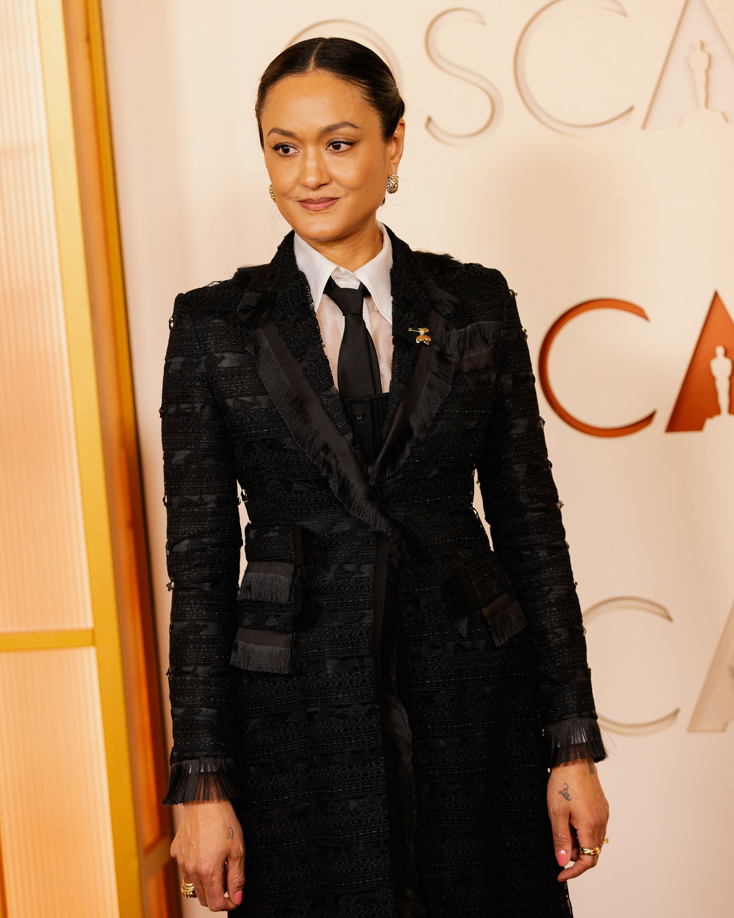Autumn Durald Arkapaw walks the carpet before becoming the first woman and first woman of color to take home an Oscar for best cinematography.