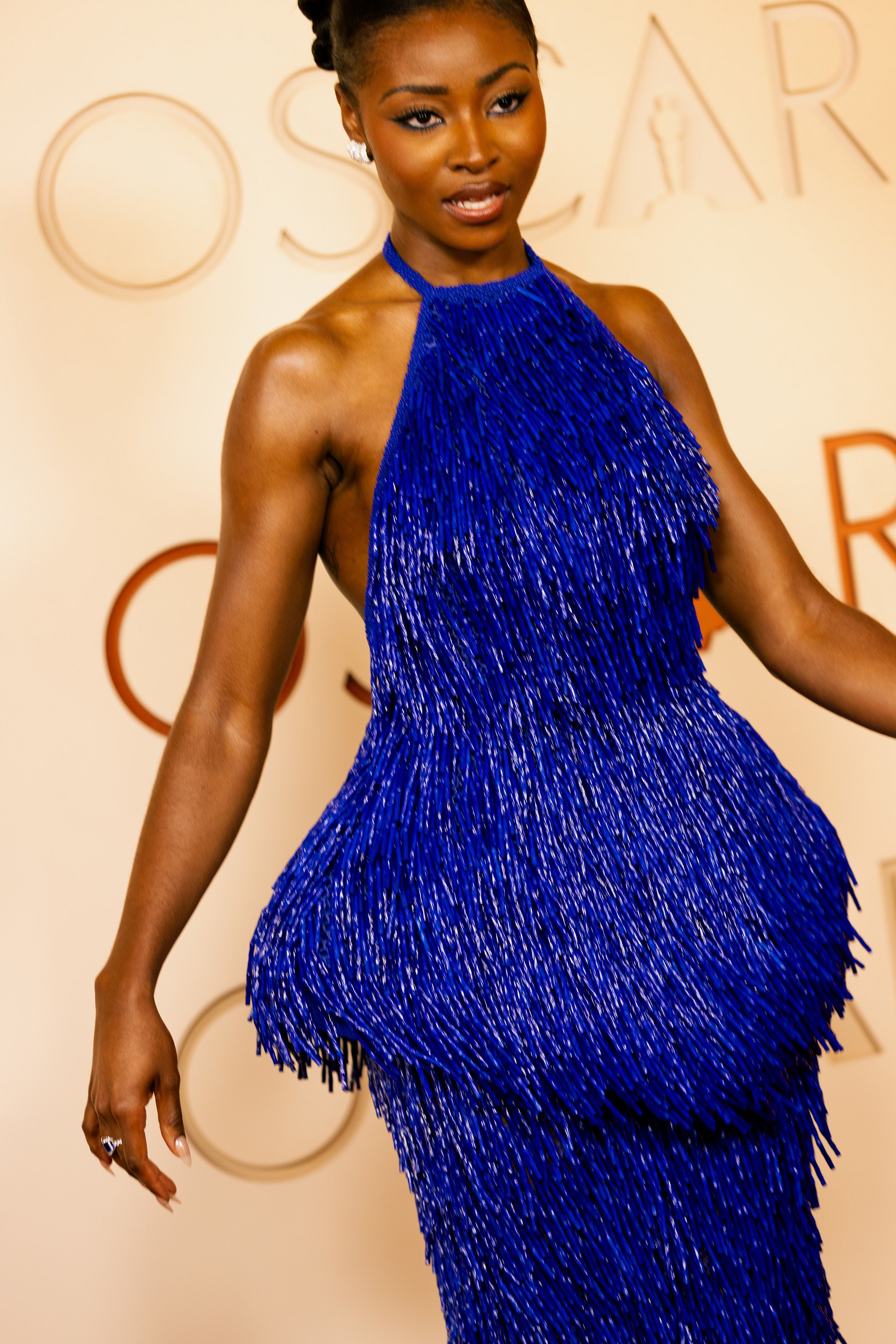 Jayme Lawson shimmered in an electric blue Loewe dress hand-embroidered with 3D-printed fringes.