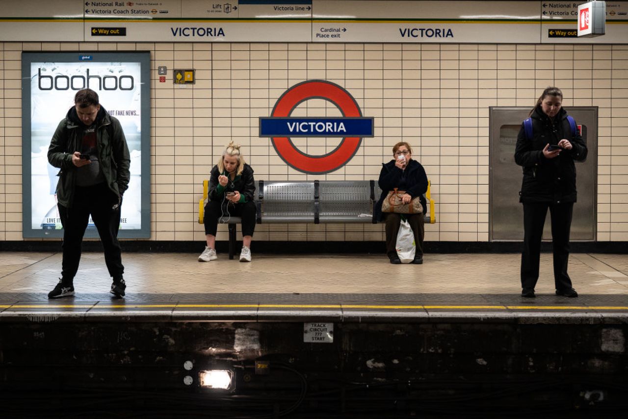 Commuters in a London Underground station on Wednesday.