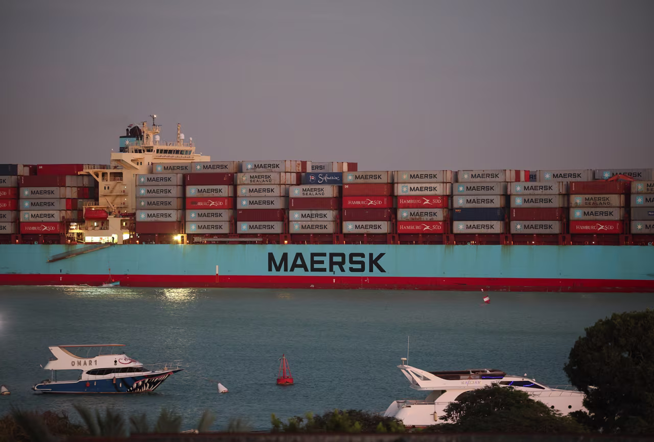 The Maersk Sentosa container ship sails southbound to exit the Suez Canal in Suez, Egypt, on December 21.