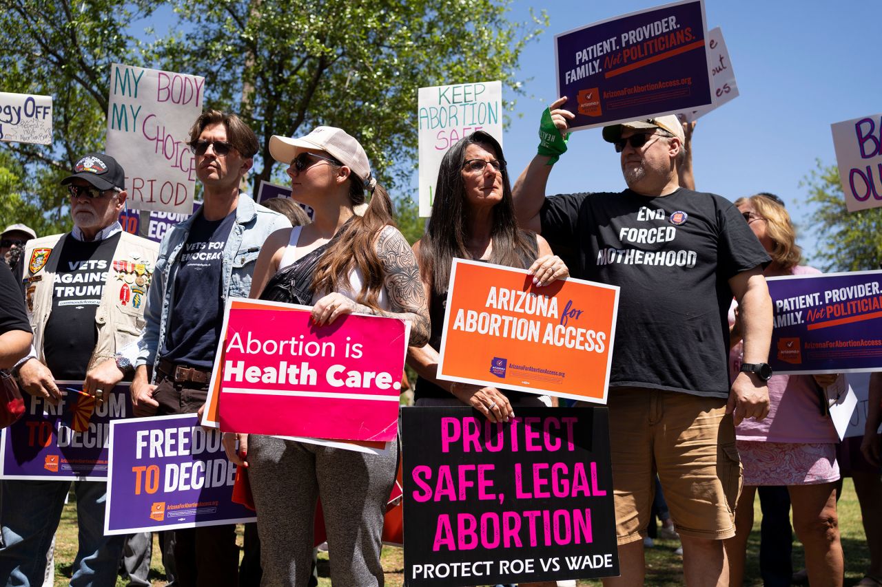 Members of Arizona for Abortion Access hold a press conference on April 17 in Phoenix. 