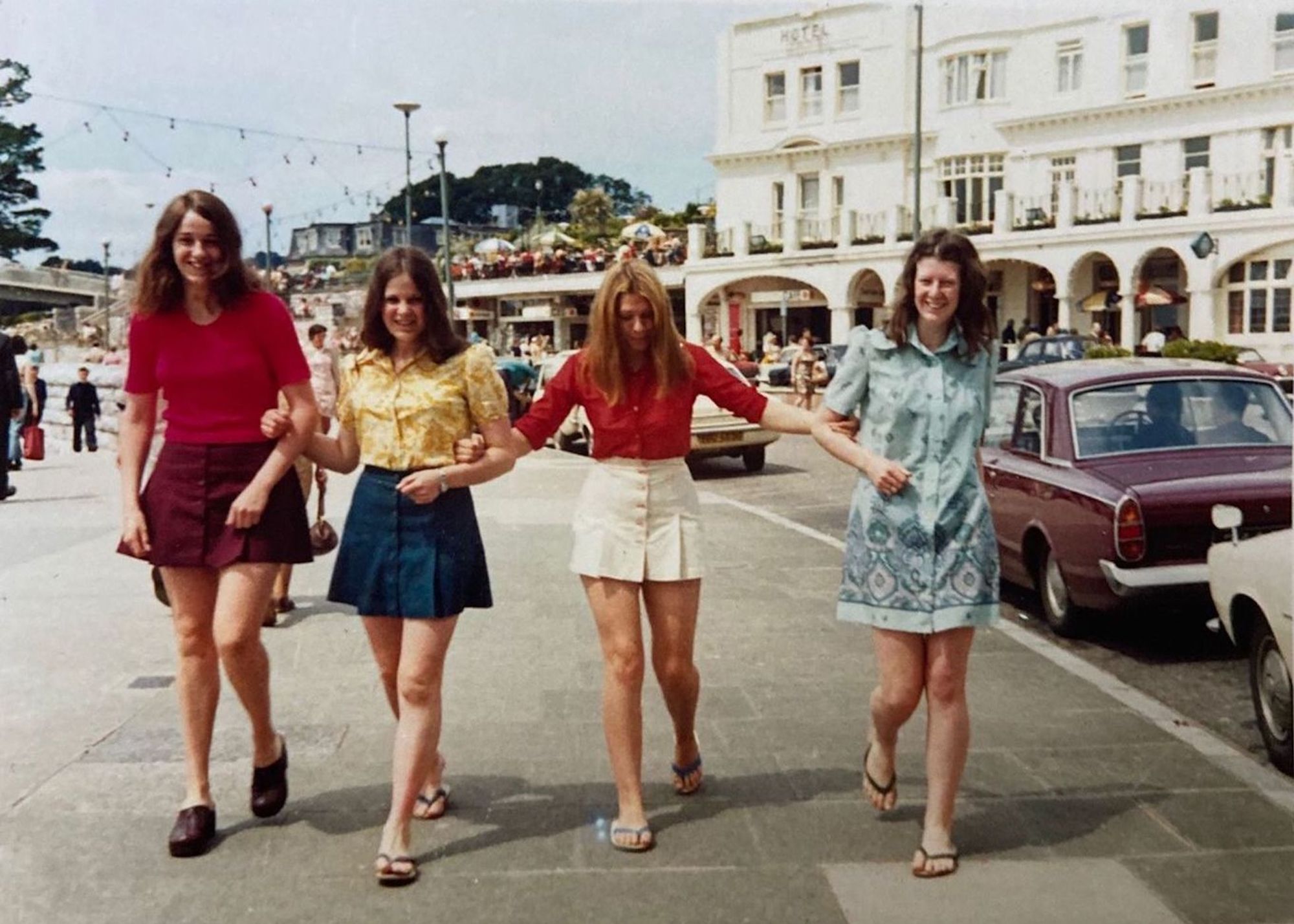 Four lifelong friends replicated this favorite vacation photo in Torquay, Devon, over 50 years later.