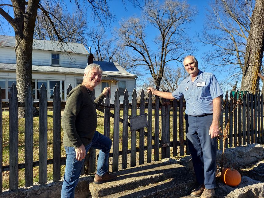 John, left, and Vernon Schmitz, right, posed for a few photos together in November 2021. They exchanged contact details and remain in touch.
