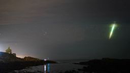 PABest A fisherman watches a meteor during the Draconid meteor shower over Howick rocks in Northumberland. Picture date: Sunday October 10, 2021.