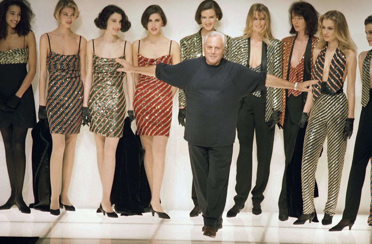 Armani walking out to applause at his ready-to-wear collection for Fall-Winter 92.