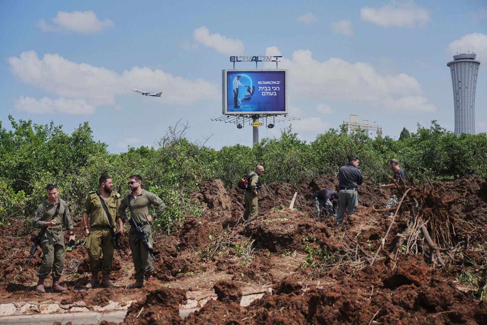 Israeli security forces inspect the site where a ballistic missile, <a href="index.php?page=&url=https%3A%2F%2Fwww.cnn.com%2F2025%2F05%2F04%2Fmiddleeast%2Fflights-halted-at-israel-airport-yemen-strike-intl">fired by Yemen's Houthi rebels</a>, landed in the vicinity of Ben Gurion International Airport near Tel Aviv, Israel, on Sunday, May 4. It forced Israel to briefly shut down the airport. <a href="index.php?page=&url=https%3A%2F%2Fwww.cnn.com%2F2025%2F05%2F05%2Fmiddleeast%2Fisrael-strikes-houthi-yemen-telaviv-airport-intl-latam">Israel retaliated</a> by striking targets in Yemen on Monday.