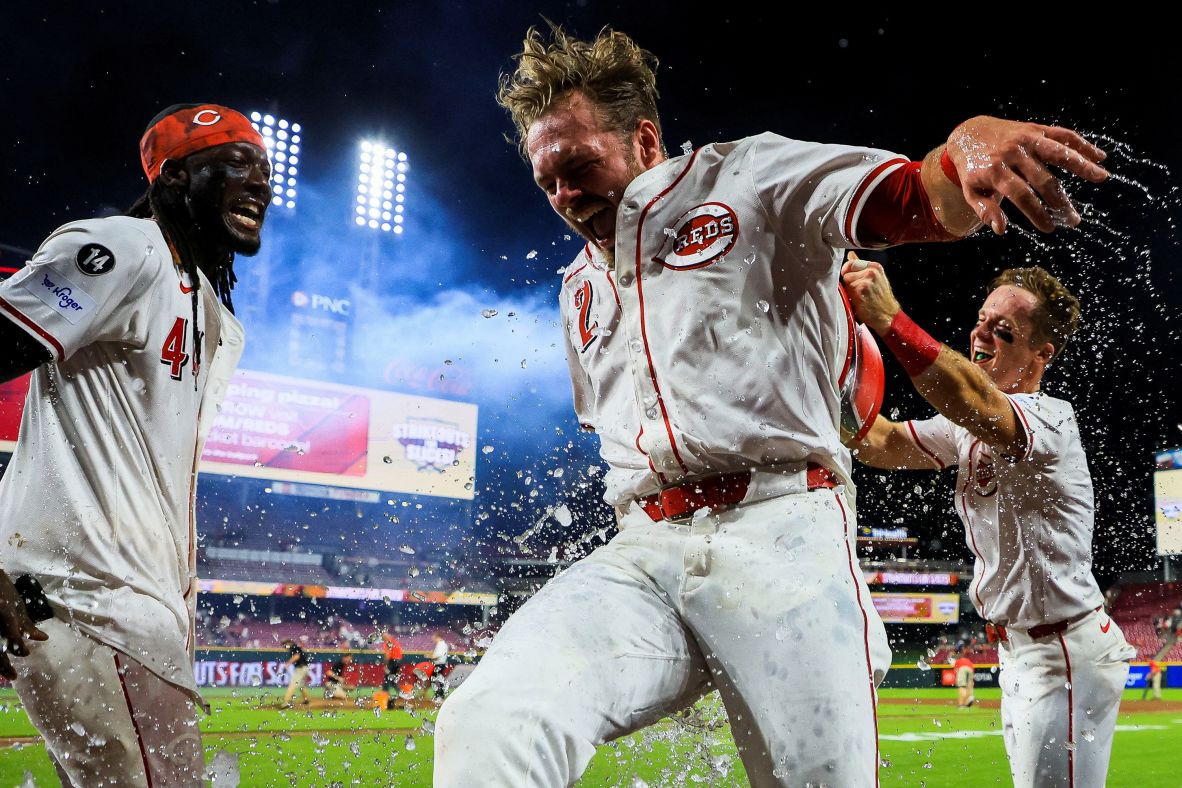 Cincinnati Reds pinch hitter Gavin Lux is doused by teammates after hitting a walk-off single to defeat the New York Yankees in a Major League Baseball game in Cincinnati on Tuesday, June 24.