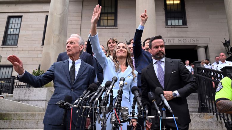 Karen Read, center, waves to supporters after she was found not guilty of second-degree murder on Wednesday, June 18, 2025, in Dedham, Mass. (AP Photo/Josh Reynolds)