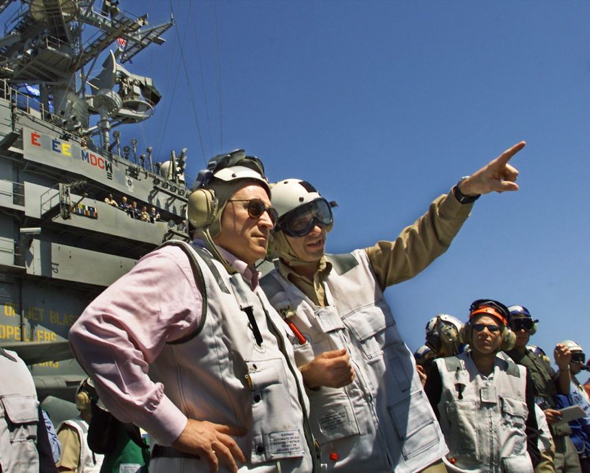 Cheney watches F-18 attack planes headed for Afghanistan catapult from the USS John C. Stennis in the Arabian Sea on March 15, 2002.