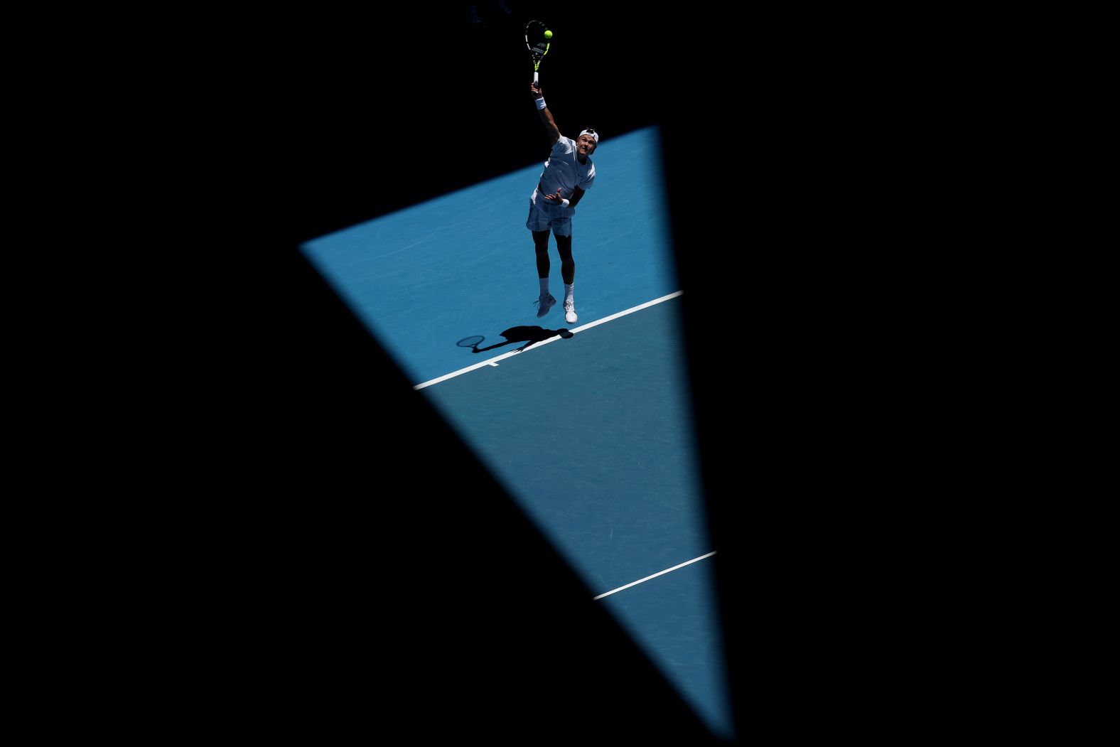 Holger Rune serves during his first-round match at the Australian Open on Tuesday, January 14.