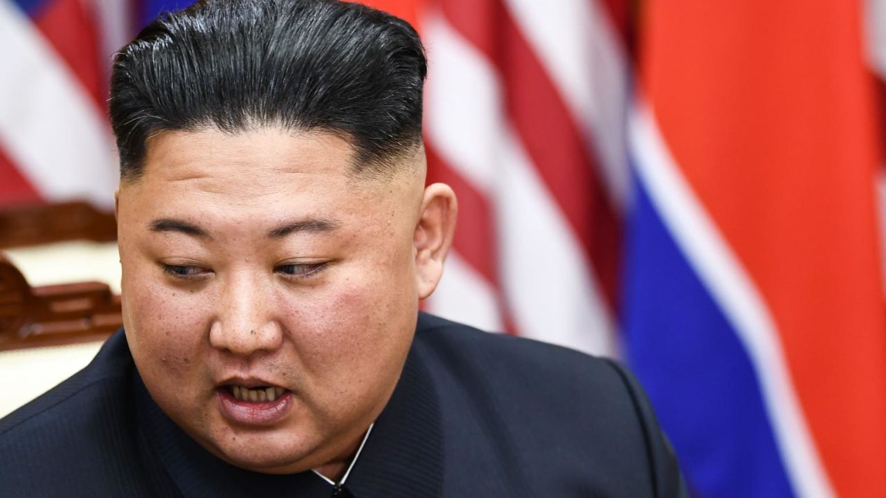 North Korea's leader Kim Jong Un attends a meeting with US President Donald Trump on the south side of the Military Demarcation Line that divides North and South Korea, in the Joint Security Area (JSA) of Panmunjom in the Demilitarized zone (DMZ) on June 30, 2019. (Photo by Brendan Smialowski / AFP)