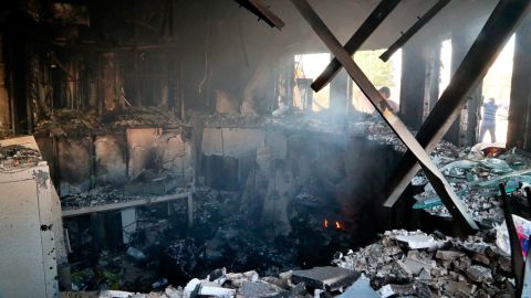 Smoke rises from a reception room at the US Embassy in Baghdad after it was attacked by pro-Iranian militiamen and their supporters.