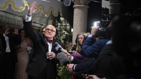 Former New York Mayor Rudy Giuliani, an attorney for President Donald Trump, speaks to reporters as he arrives for a New Year's Eve party hosted by President Donald Trump at his Mar-a-Lago property, Tuesday, Dec. 31, 2019, in Palm Beach, Florida.