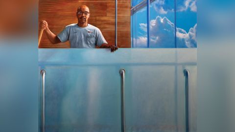 Clyde Huntley, subject of this painting by artist Mario Moore. Its title is "Clyde sky high." 