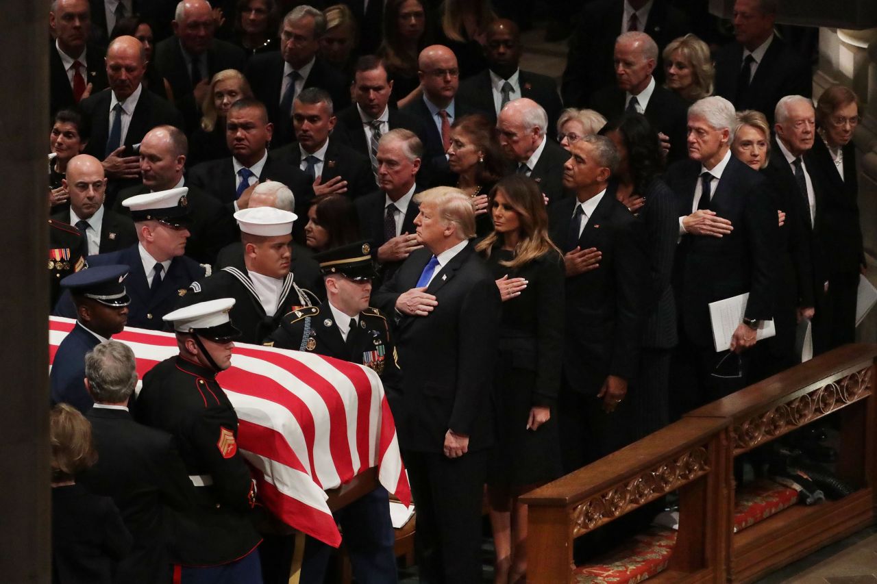 President Donald Trump and first lady Melania Trump join the Clintons and other former Presidents and first ladies at the state funeral for George H.W. Bush in December 2018.