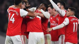 Arsenal's Greek defender Sokratis Papastathopoulos celebrates with teammates after scoring the second goal in the 2-0 win over Manchester United at the Emirates Stadium on New Year's Day.