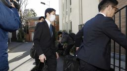 Prosecutors arrives at former Nissan Chairman Carlos Ghosn's residence for a raid in Tokyo Thursday, Jan. 2, 2020.